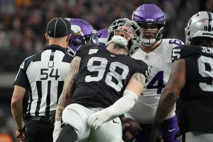 Dec 10, 2023; Paradise, Nevada, USA; Las Vegas Raiders defensive end Maxx Crosby (98) celebrates after a tackle against the Minnesota Vikings in the first half at Allegiant Stadium. Mandatory Credit: Kirby Lee-USA TODAY Sports